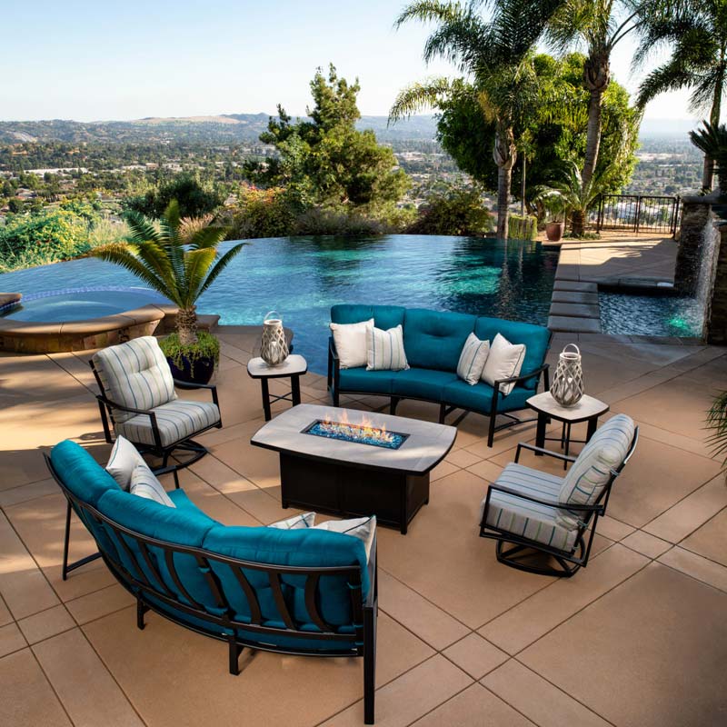 Blue Patio Furniture near the pool available at California Backyard