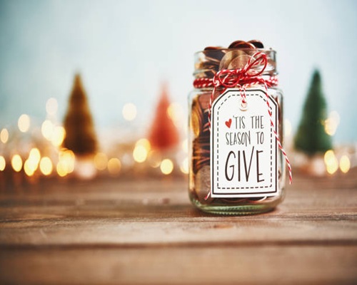 It's The Season To Give. Donation Jar With Money